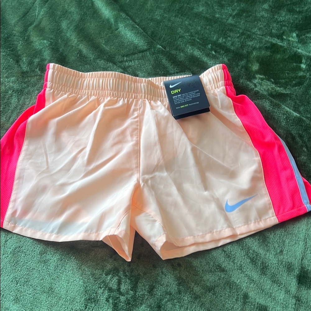 Nike girl’s Light Peach Athletic Shorts  Hot Pink Panels and Blue Swoosh Sz M
